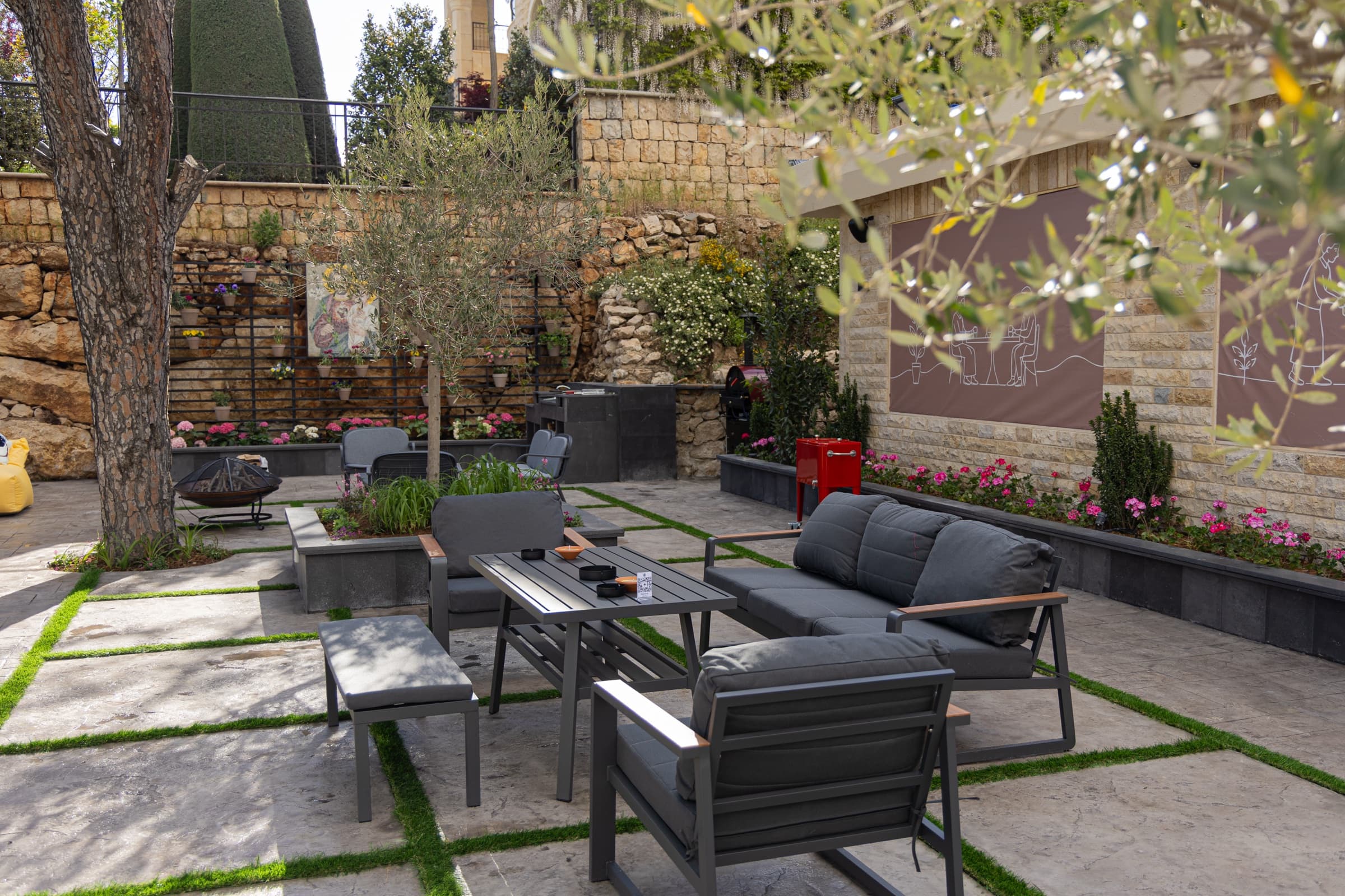 Outdoor lounge seating under the trees