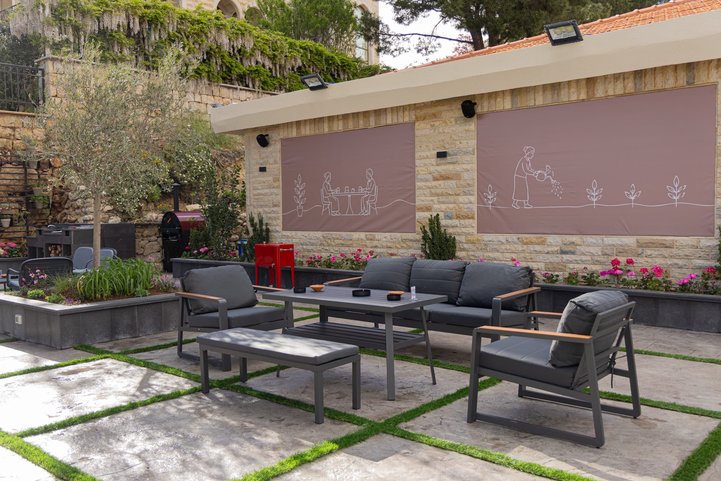 Shaded patio seating with wall illustrations